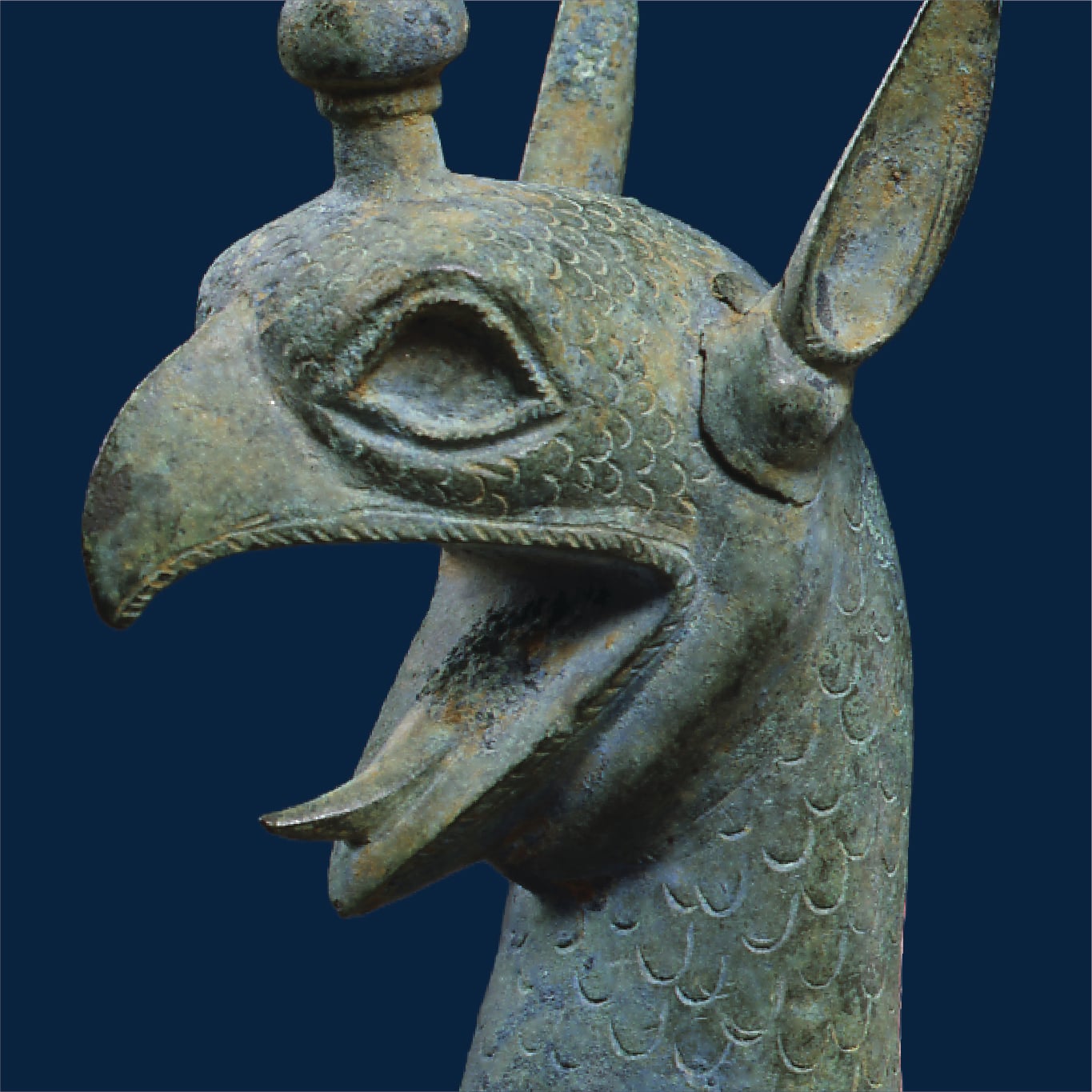 Ancient bronze griffin head sculpture close-up