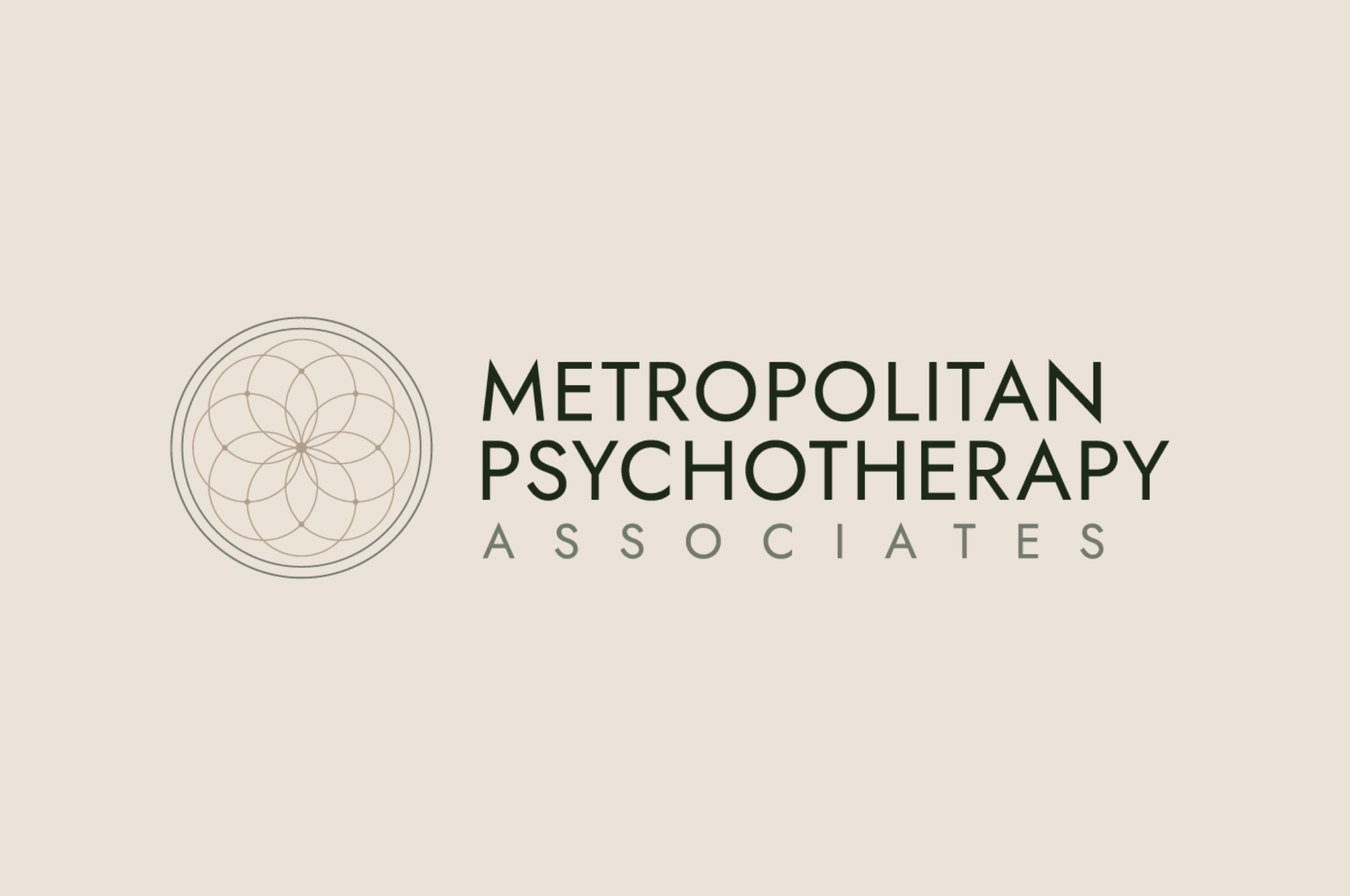 Metropolitan Psychotherapy Associates logo with flower emblem
